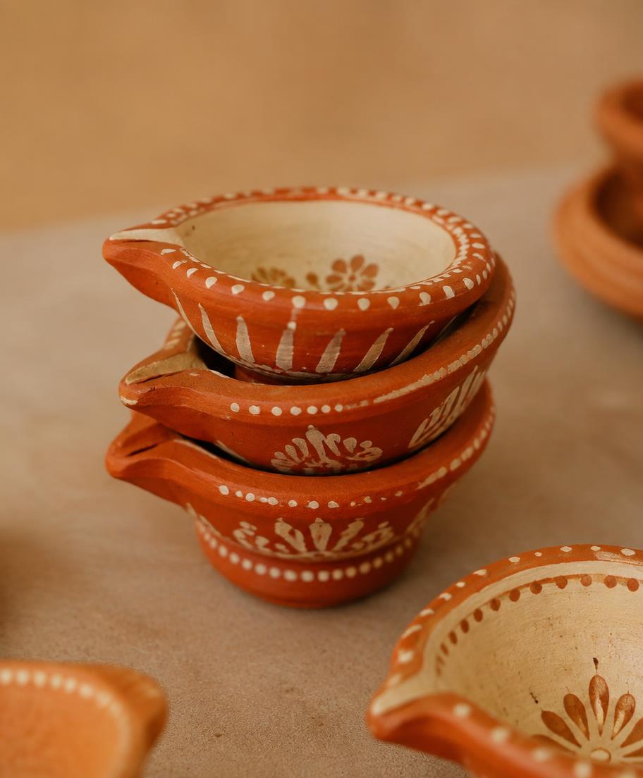 Stacked diyas